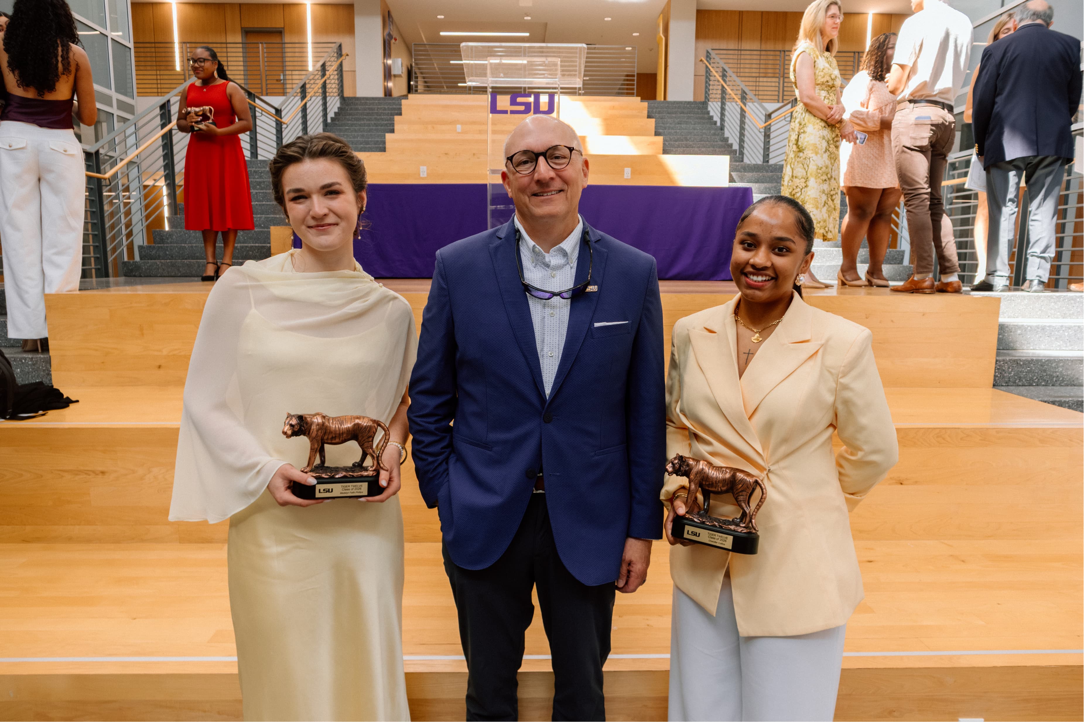 Dr. Matt Lee with Madelyn Phillips and Chandler Collins at the LSU Tiger Twelve Ceremony