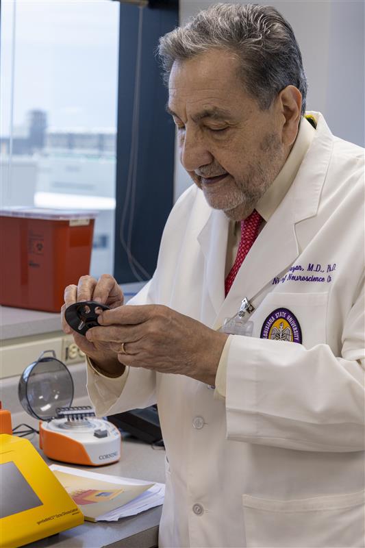 Dr. Bazan in lab