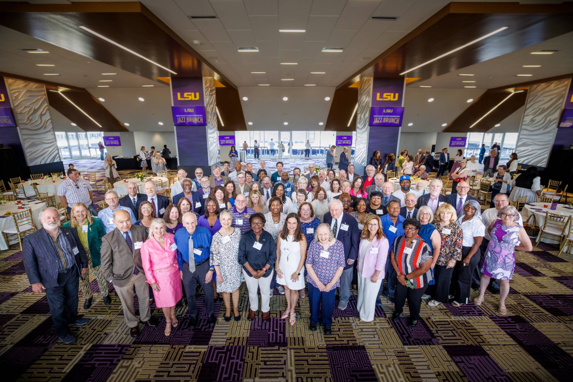 Faculty and staff gather in Tiger Stadium’s South Club during LSU’s 2026 Faculty & Staff Recognition Jazz Brunch honoring employees with 25 to 60 years of service to the university.