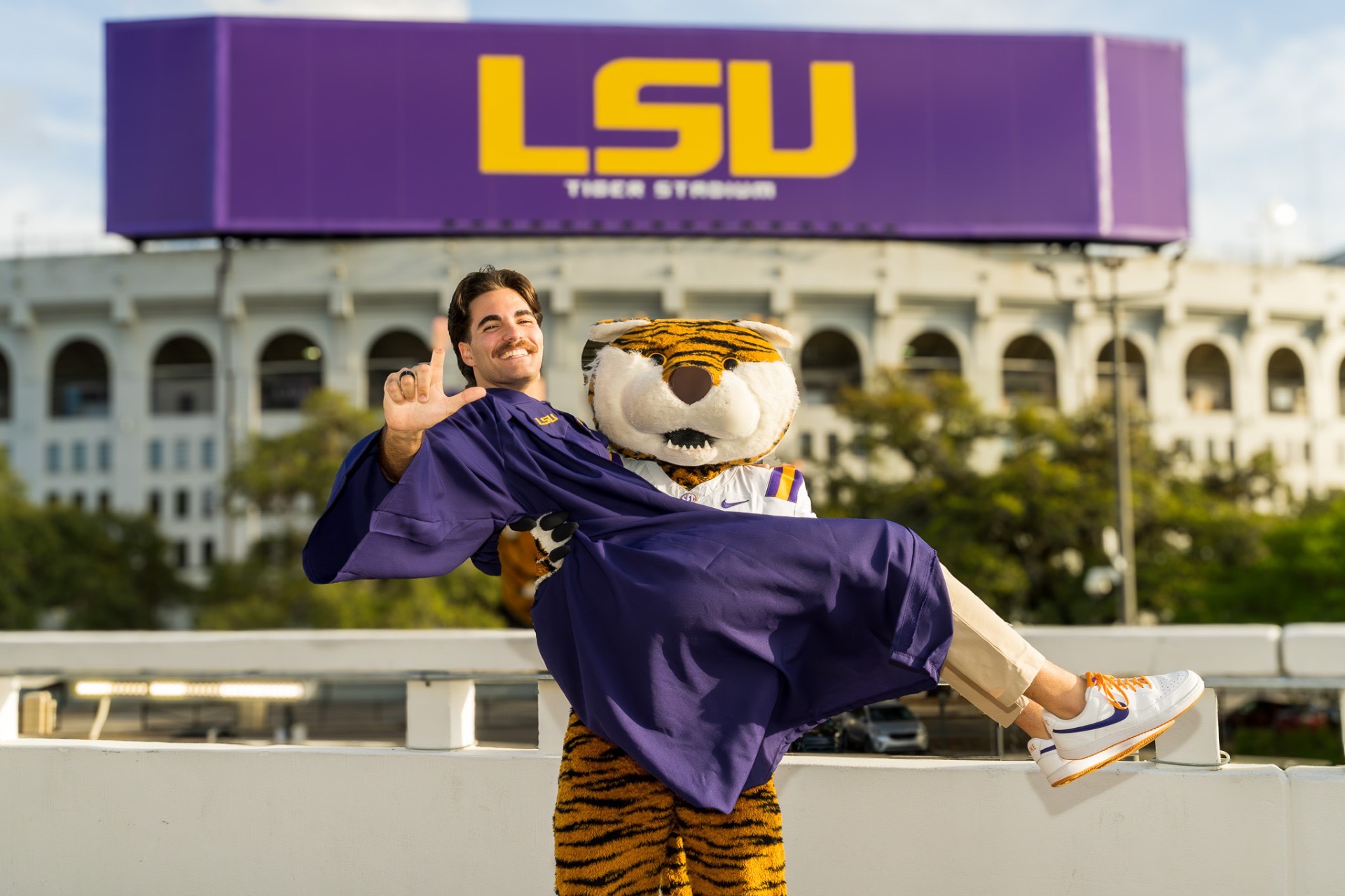 Landon Terro poses with Mike the Tiger in front of Tiger Stadium Landon Terro poses with Mike the Tiger in front of Tiger Stadium