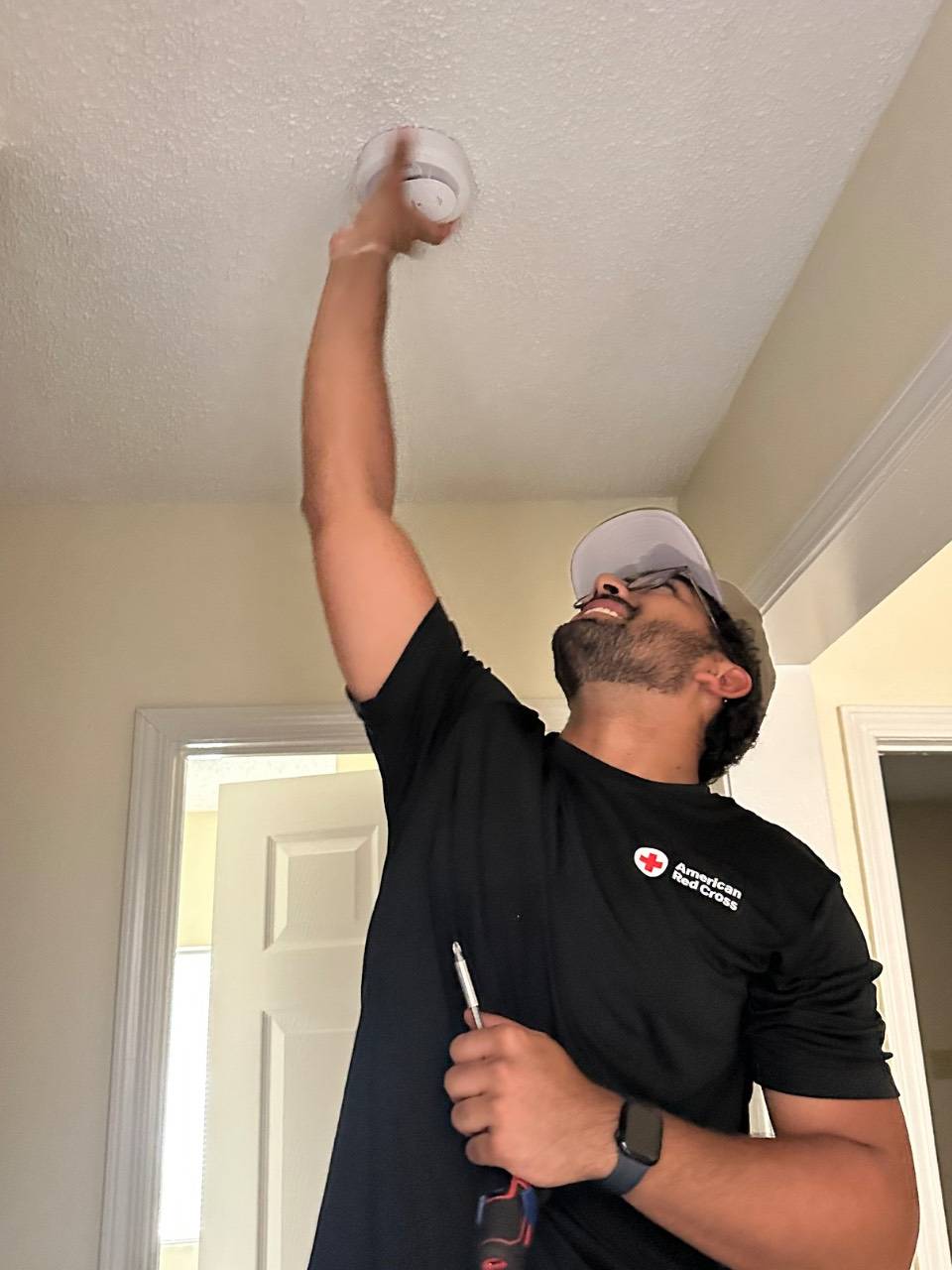 Mihir Babbar installs a smoke detector