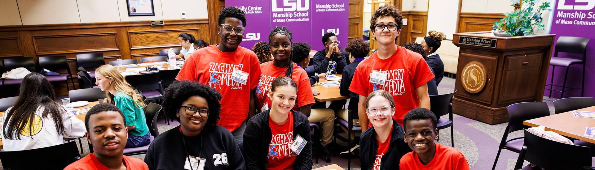 LSPA conference, students sitting at a table.