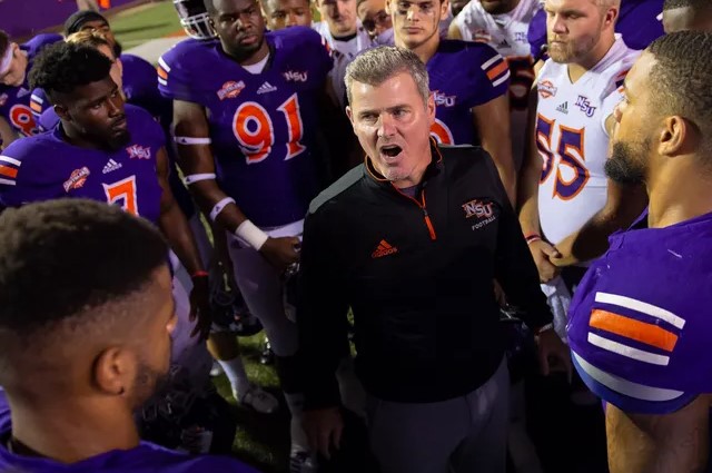 Brad Laird with the football team Northwestern State University Football Coach Brad Laird with the team.