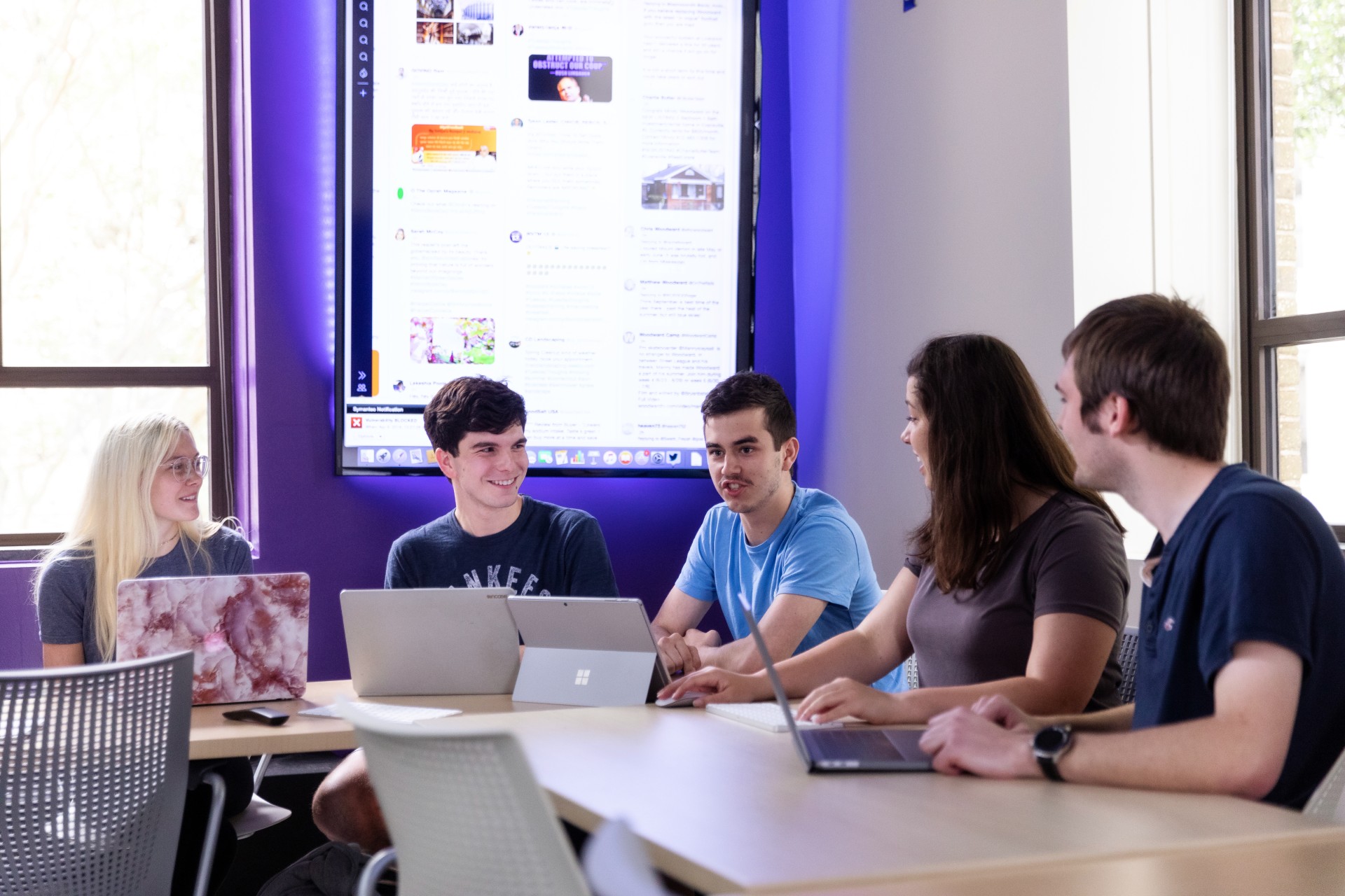 Students in SMAC Lab Students around a table talking