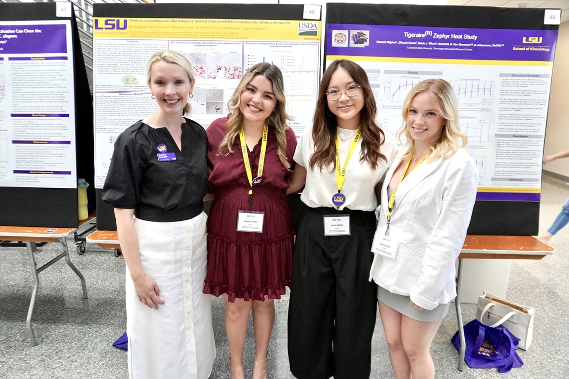 Professor with three students