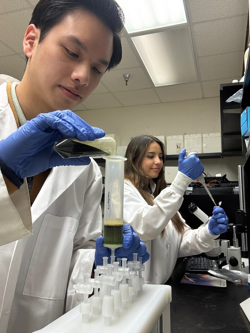 Two students working in a research lab