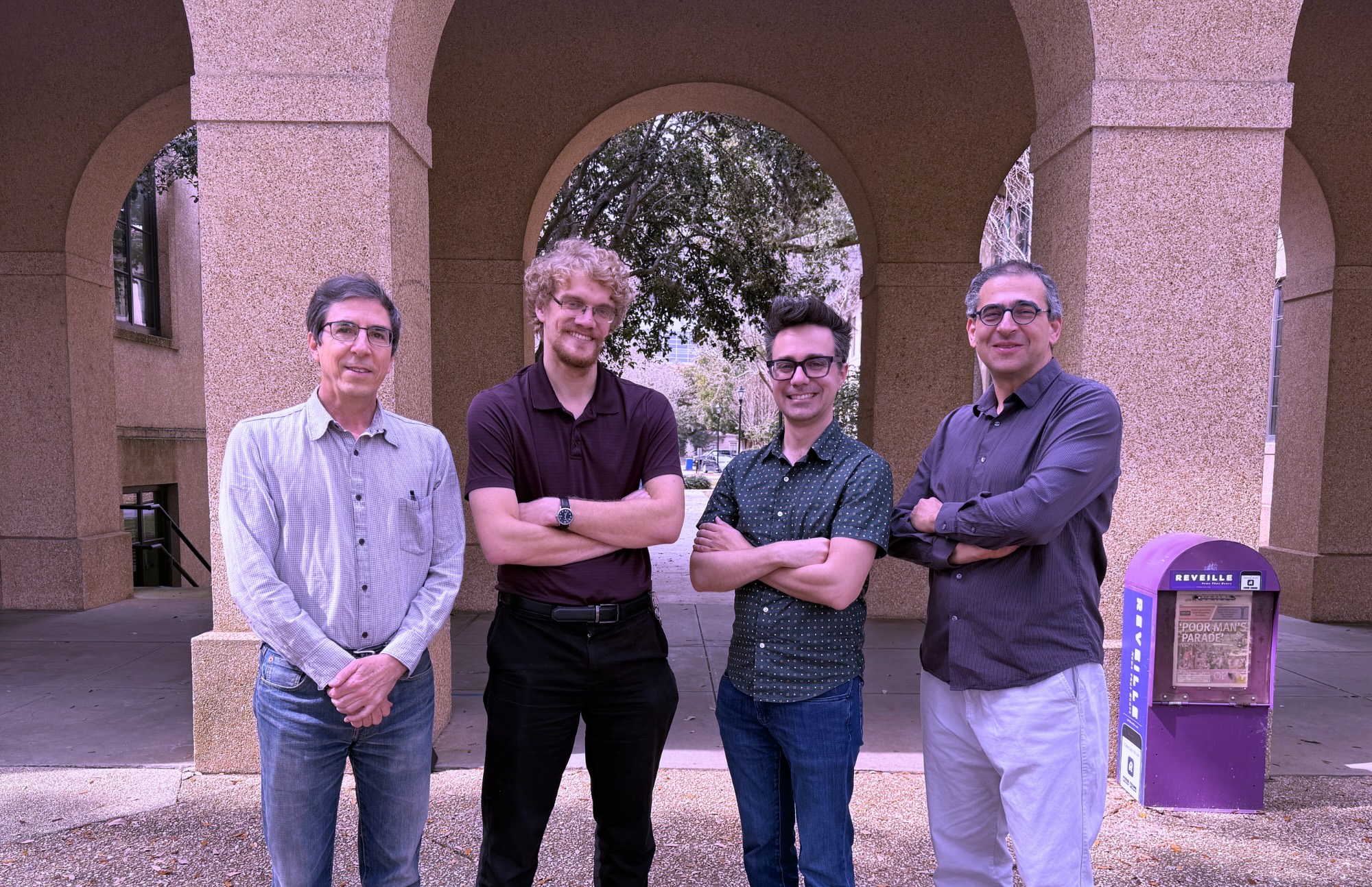 A team of scientists posing for picture